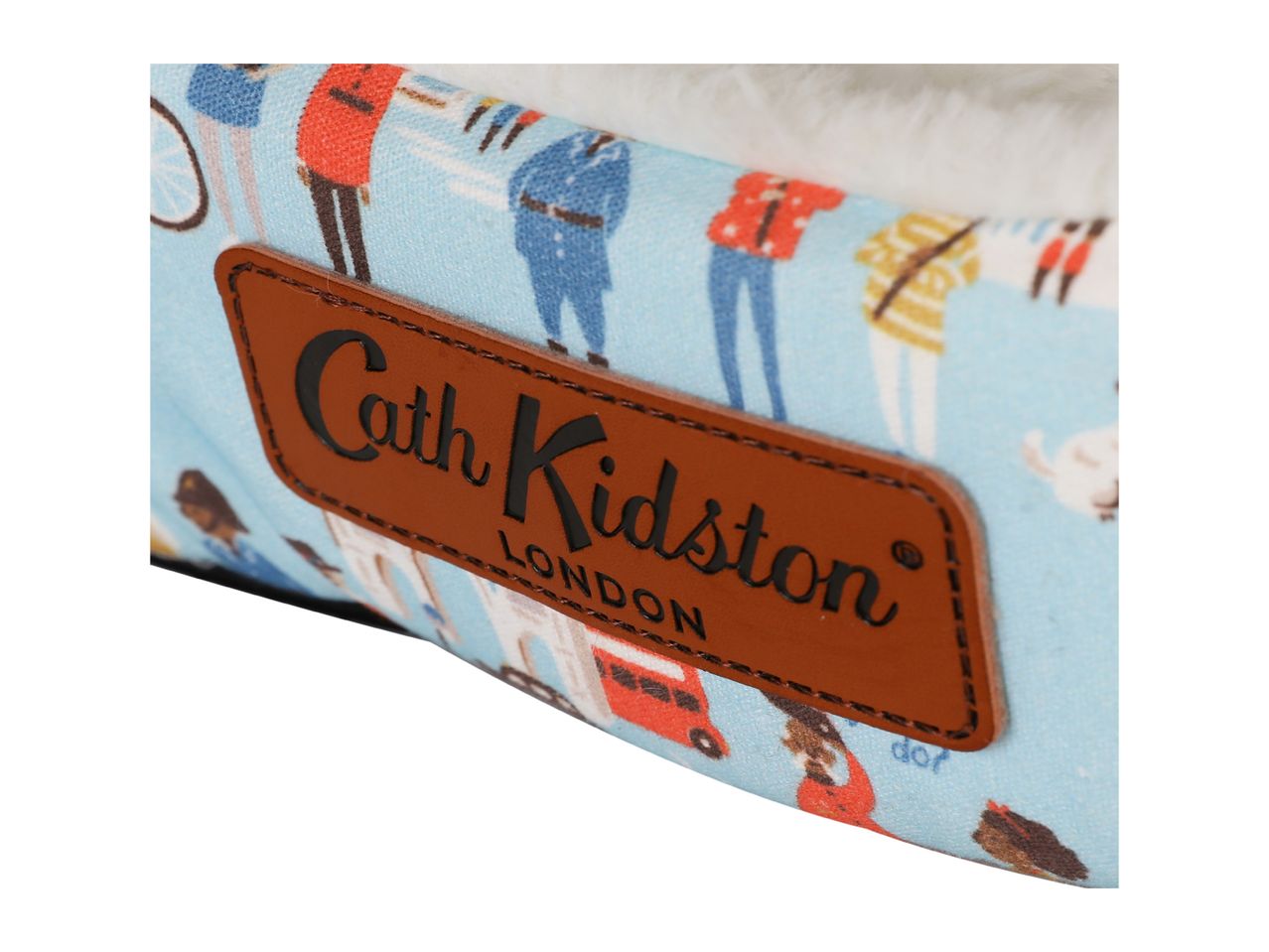 Cath Kidston London pet bed with a light blue fabric featuring people and a red bus.