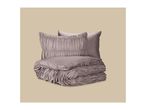 Ruched duvet cover and pillowcase set in a dusty mauve color