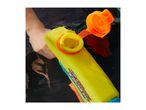 A person's hand holding a yellow water blaster partially submerged in dark water.