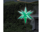 LIVARNO home Inflatable LED Christmas Star hanging outdoors against a dark, leafy wall.