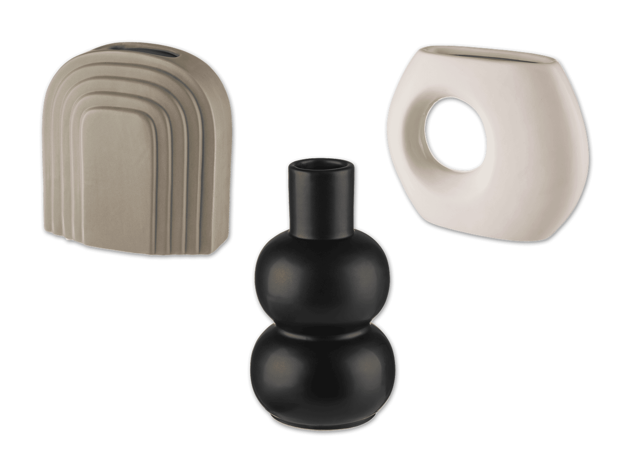 Drei moderne Vasen: eine beige, eine schwarze und eine weiße.