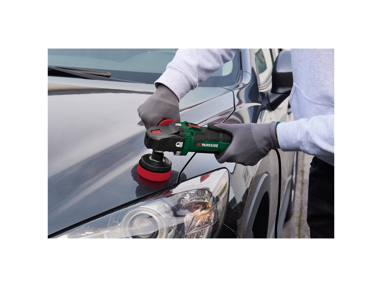 Car polishing with Parkside rotary polisher.