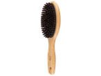 Brosse à cheveux ovale en bois avec poils noirs, vue de côté.