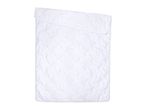 White quilted duvet or blanket, folded at the top, on a white background.