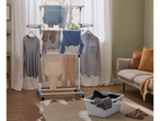 W5® laundry basket and clothes drying rack in a living room.