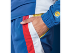Roupas esportivas Lidl: jaqueta e calça, estilo color block.