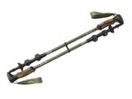 Pair of green trekking poles with cork handles and black accents