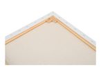 Back of a stretched canvas with wooden frame and corner keys, showing staples