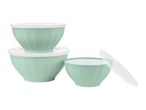 Set of three mint green mixing bowls with white lids, one bowl open