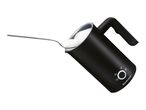 SilverCrest milk frother with a spoon scooping out foam