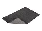 Dark grey bath mat with a textured surface and a lighter grey ribbed underside visible.