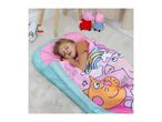 Child sleeping in a pink and blue sleeping bag with cartoon animal designs.