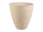 Beige planter with a wavy, textured surface