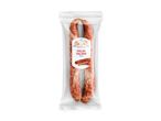 Pakket polsk salami med et farverigt folkeinspireret etiketdesign.