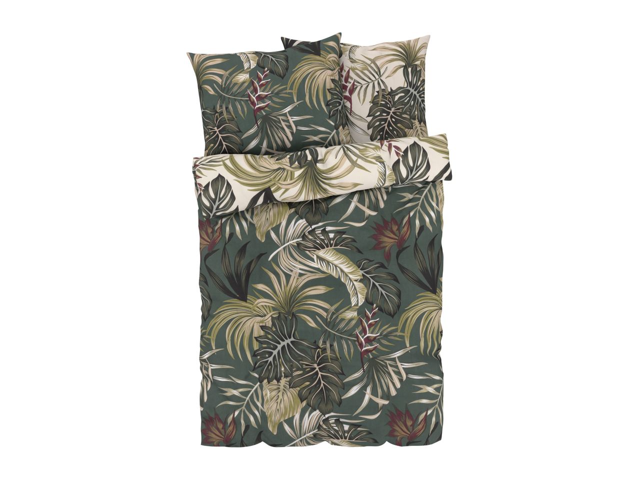 Tropical bedding: duvet cover and pillows with leaf print.