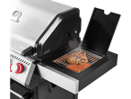 Steak grilling on a gas grill.
