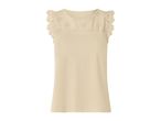 Cream-colored women's top with embroidered eyelet details on the shoulders and neckline.
