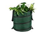 Green garden waste bag filled with fresh green leaves and branches.