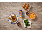 McEnnedy Hot Dog Sausages in a jar, served in buns with various toppings, curly fries, and padron peppers.