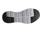 Underside of a black and white shoe sole with a textured pattern
