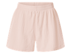 Rózsaszín, ráncolt anyagú, gumis derekú rövidnadrág.