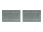 Two rectangular light green bath mats with a textured border design.
