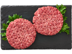 Du žali Grill jautienos mėsainių paplotėliai su salotomis ant tamsios skalūno lentos.