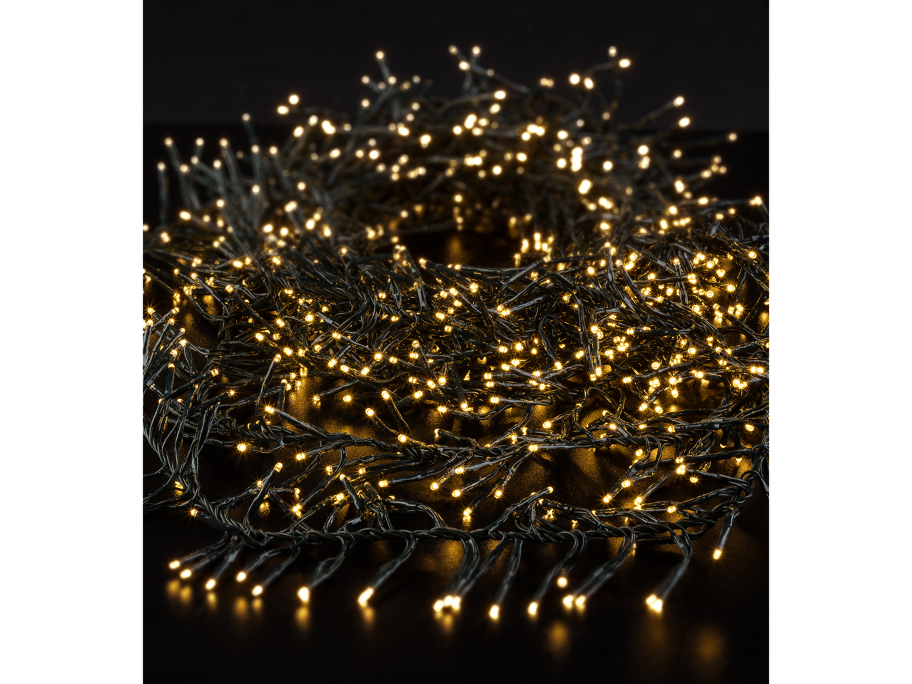 Warm white LED cluster lights on a dark background