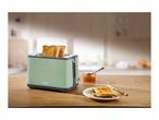 SilverCrest toaster with two slices of toast, jam, and a knife on a wooden table.