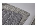 Two grey quilted blankets on a white bedsheet.
