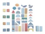 Wooden building blocks in various shapes and colors, featuring sea creatures and underwater plants.