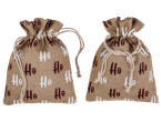 Du džiuto dovanų maišeliai su „Ho Ho“ spauda.