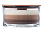 A three-layered candle in a glass jar with a wooden lid.