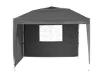 Grey gazebo with a window.