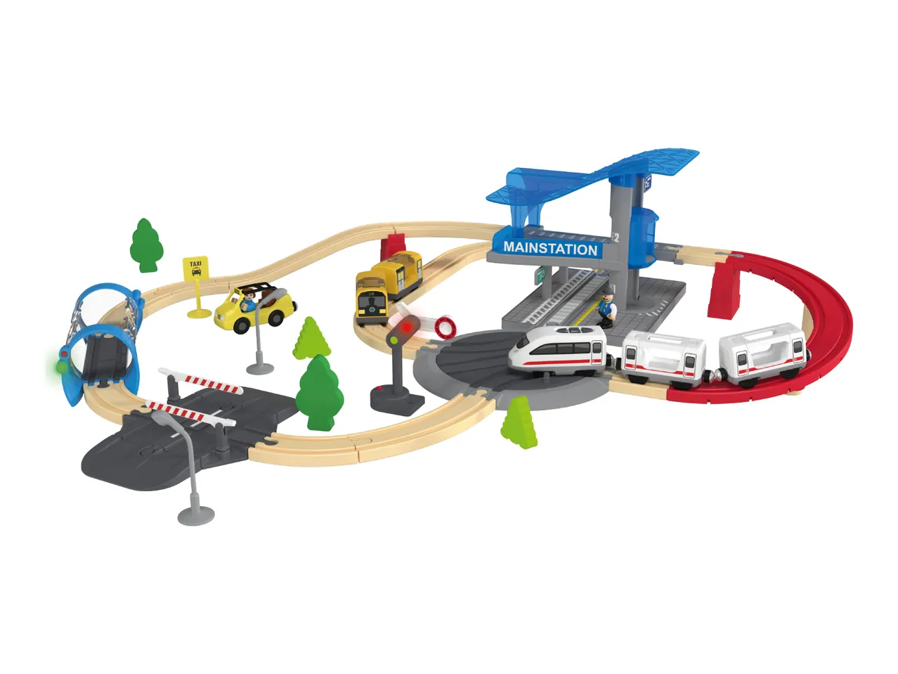 Toy train set with a main station, tracks, trains, a taxi, and trees.