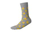 Grey sock with a pattern of yellow rubber ducks wearing Santa hats