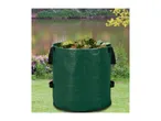 Green garden waste bag filled with leaves, set in a garden by a pond.