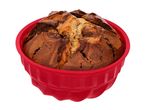 Marble cake in a red silicone baking mold