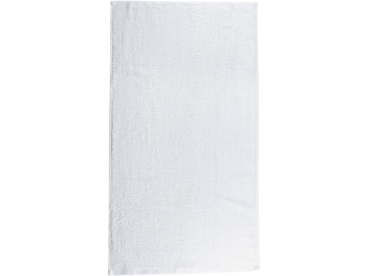 Asciugamano bianco di spugna morbida.