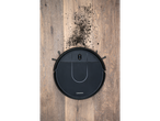 SILVERCREST® Robot Vacuum Cleaner on a wooden floor with dirt