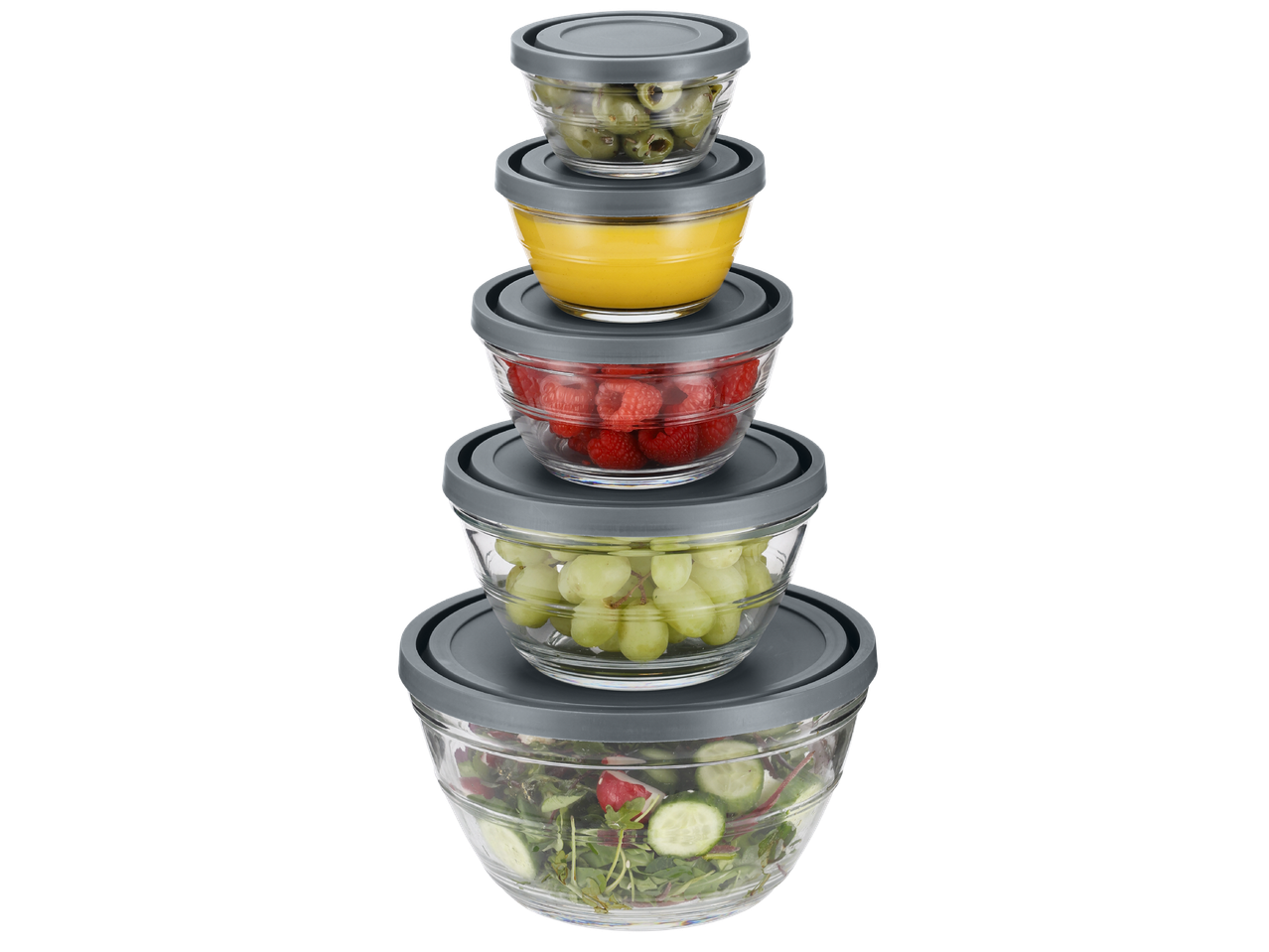 Подредени стъклени купи с капаци, пълни с маслини, сос, малини, грозде и салата.