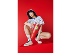 Model with Lidl clothing and travel mug.