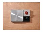 Digital kitchen scale with two weighing platforms, one showing 5.02g of chili flakes.