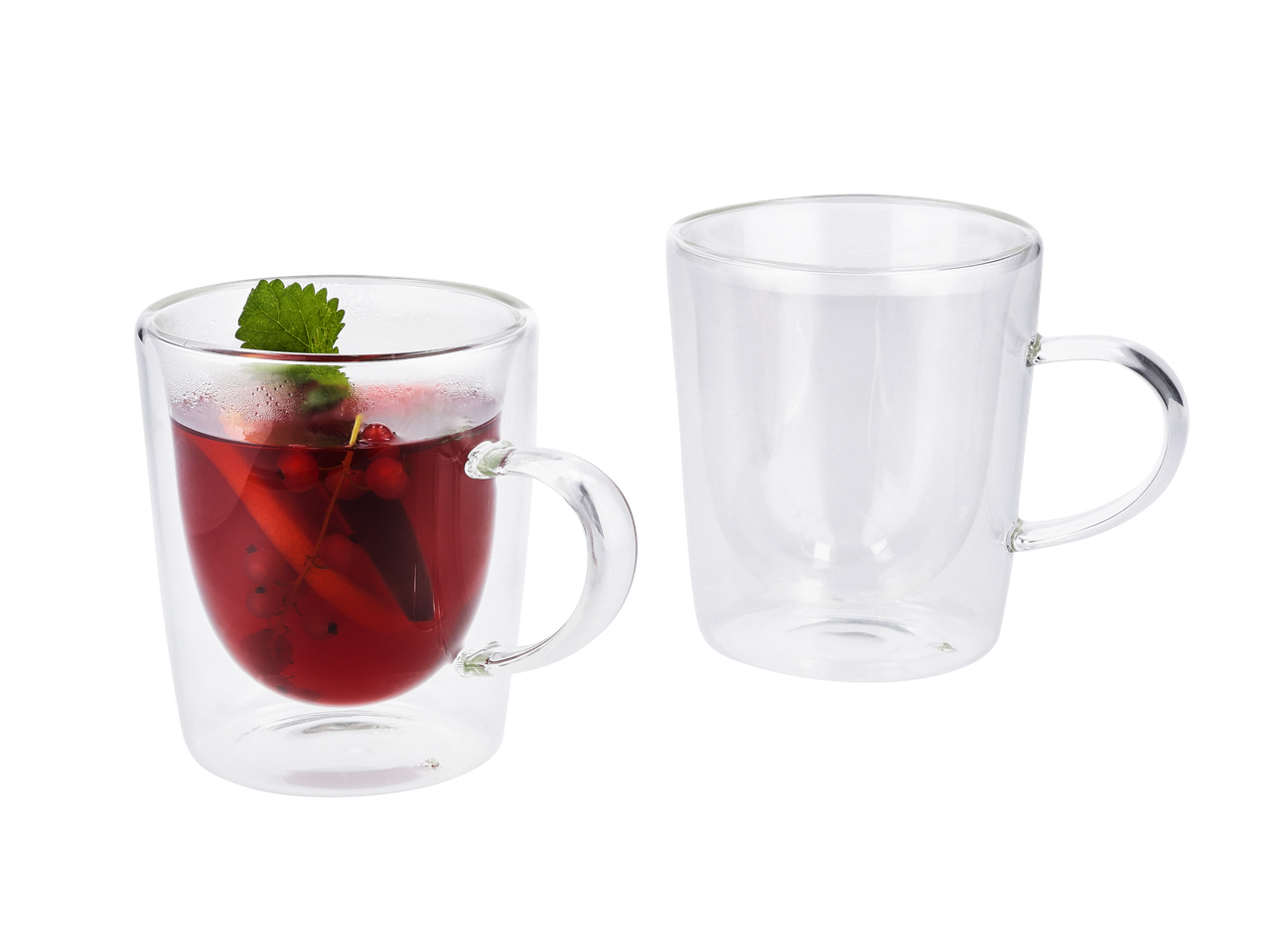 Twee dubbelwandige glazen mokken, één met fruitthee en munt.