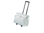 Rolling suitcase with polka dots, perfect for picnics.
