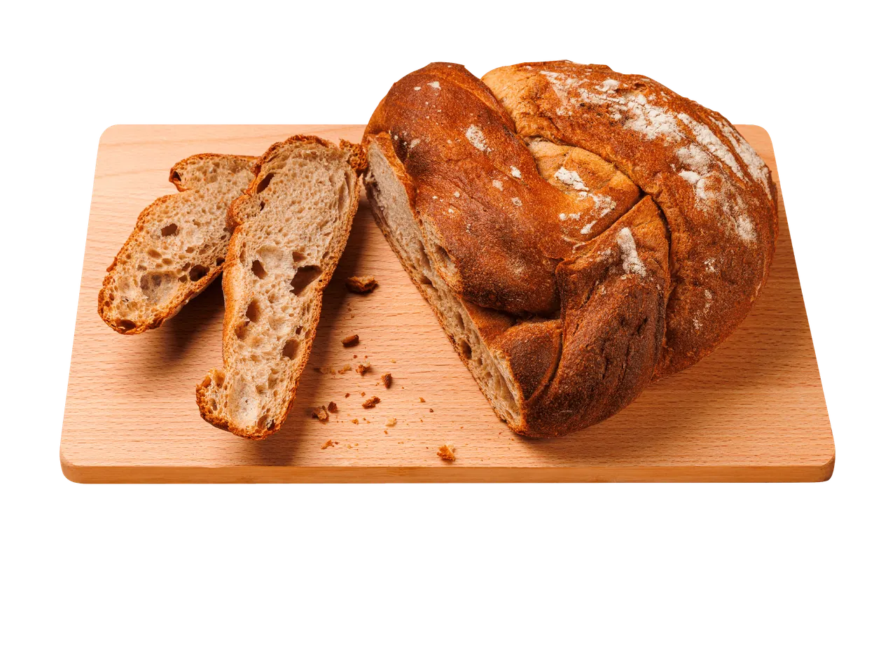 Pain de campagne tranché sur une planche à découper en bois.
