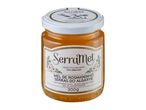 Jar of wild lavender honey with a white label and lid, featuring floral and bee illustrations.