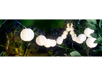 Outdoor string lights with white paper lanterns.