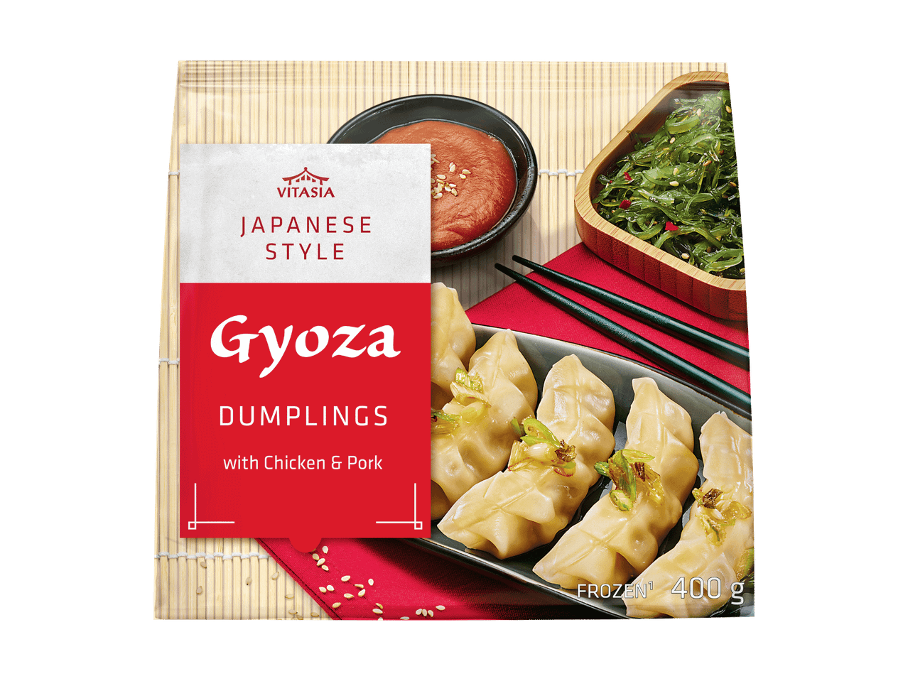 Gyoza japonais au poulet et porc, avec sauce et salade d'algues.
