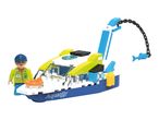 Toy boat with a crane, a shark, and a minifigure wearing a blue cap and glasses.